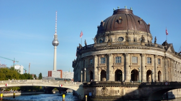 Image of a Berlin landmark and river, including the Berlin TV Tower.